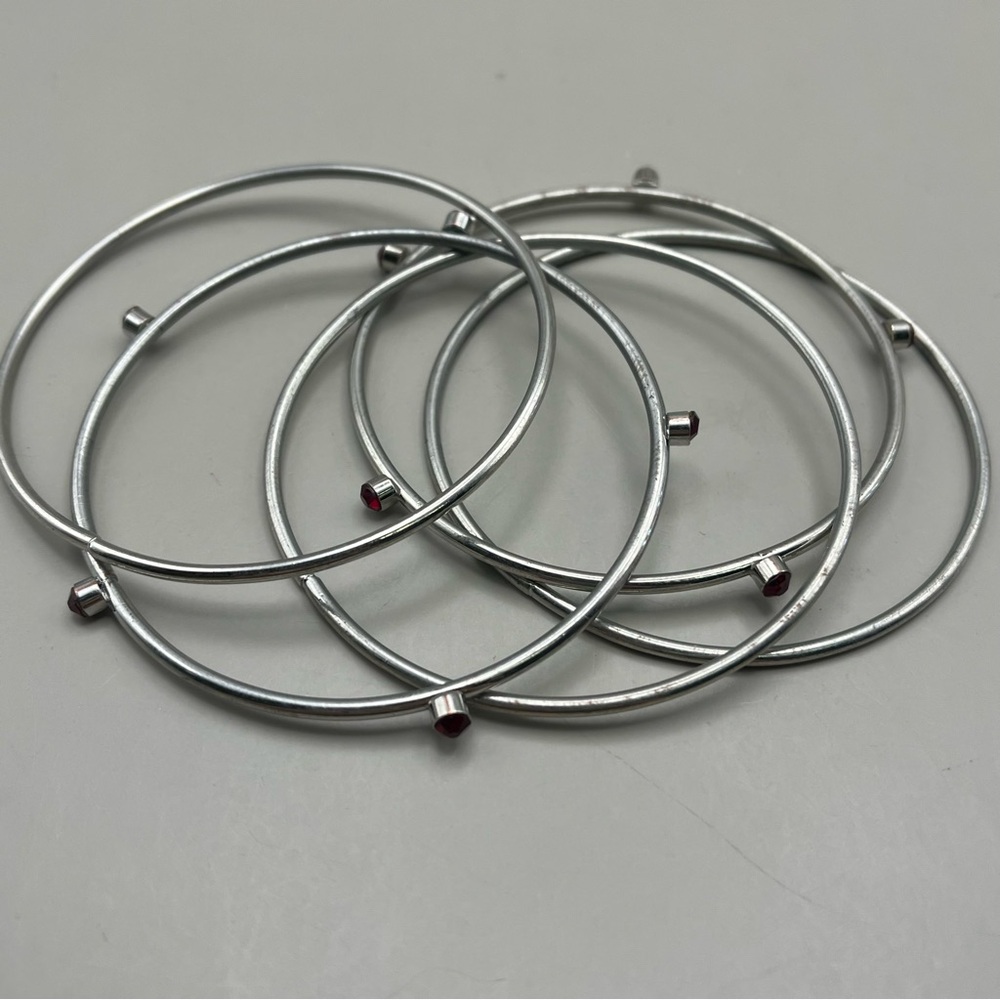 Elegant Silver Bangle Set with Red Accents